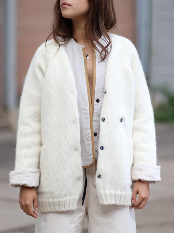 the knitwit stable fant shop online knitwit cardigan dutch wool collab atelier sukha coconut white wool cover